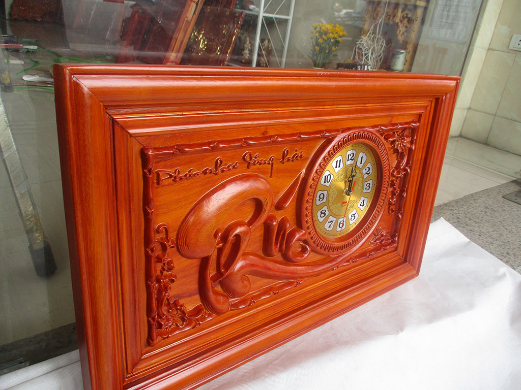 đồng hồ gỗ chữ phúc 68cm
